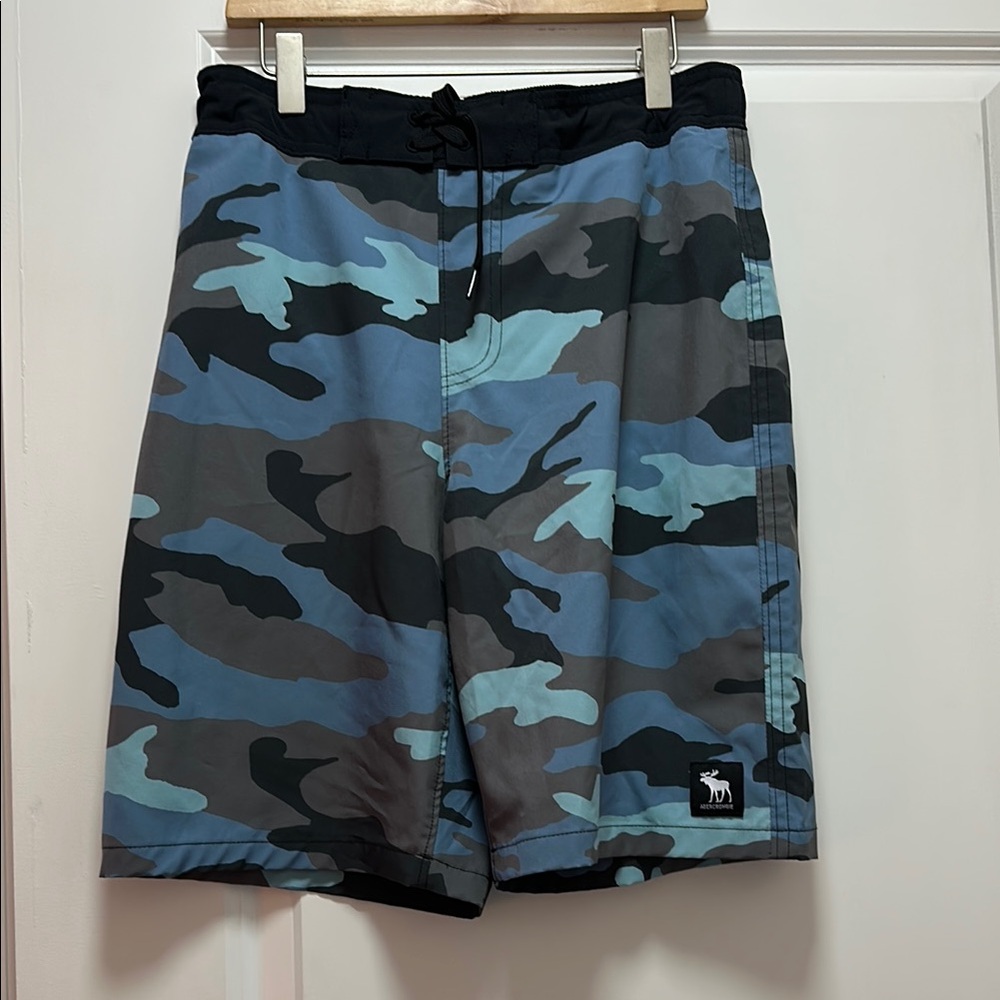 Black and Blue Board Shorts with Modern Camo Design